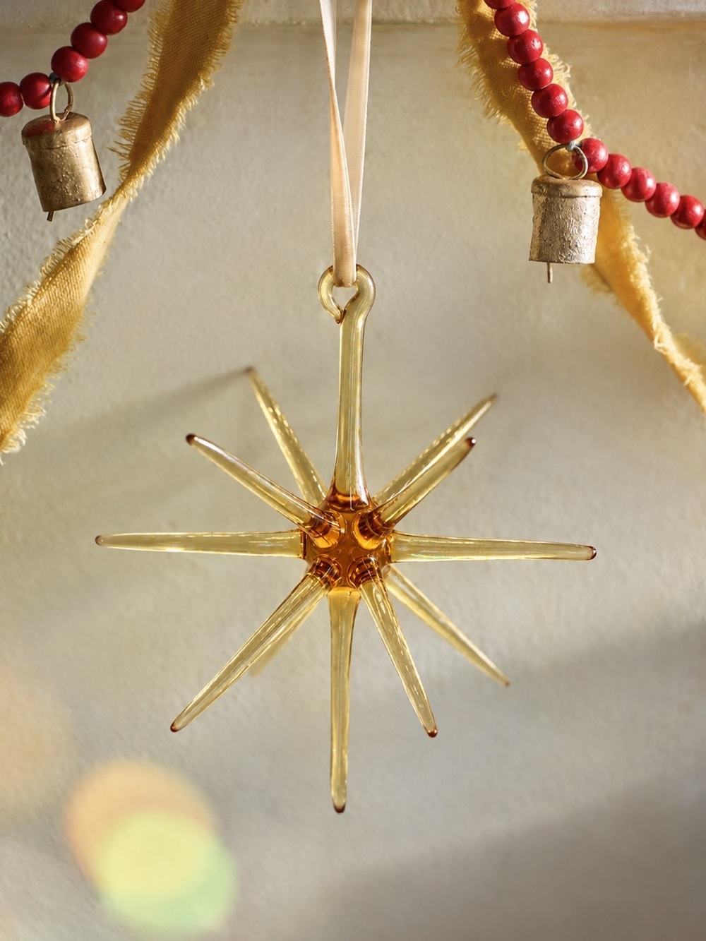 Terrain Starburst Glass Ornament, Amber
